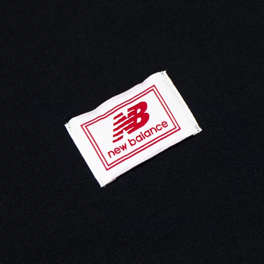 Camiseta New Balance Woven Label Preto