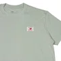 Camiseta New Balance Woven Label Verde